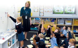 THRASS teacher with group of students